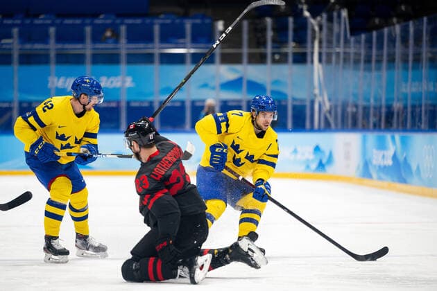 220216 Joakim Norström and Henrik Tömmernes of Sweden against Tyler Wotherspoon of Canada in the men?s Ice hockey, Eishockey quarterfinal between Sweden and Canada during day 12 of the 2022 Winter Olympics on February 16, 2022 in Beijing. Photo: Maxim Thore BILDBYRAN kod MT MT0326 ishockey ice hockey Olympic Games, Olympische Spiele, Olympia, OS olympics winter olympics os ol olympiska spel vinter-os olympiske leker peking peking 2022 beijing 2022 beijing 2022 olympic games beijing 2022 winter olympic games peking-os beijing-ol vinter-ol 12 bbeng kvartsfinal sverige kanada Copyright: MAXIMxTHORE BB220216MT132