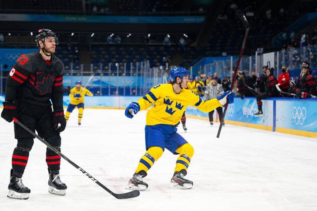 220216 Lucas Wallmark of Sweden celebrates the 1-0 goal in the men?s Ice hockey, Eishockey quarterfinal between Sweden and Canada during day 12 of the 2022 Winter Olympics on February 16, 2022 in Beijing. Photo: Maxim Thore BILDBYRAN kod MT MT0326 ishockey ice hockey Olympic Games, Olympische Spiele, Olympia, OS olympics winter olympics os ol olympiska spel vinter-os olympiske leker peking peking 2022 beijing 2022 beijing 2022 olympic games beijing 2022 winter olympic games peking-os beijing-ol vinter-ol 12 bbeng kvartsfinal sverige kanada jubel Copyright: MAXIMxTHORE BB220216MT153