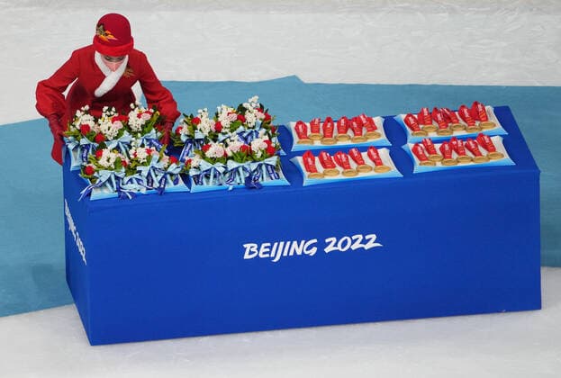 China Olympics 2022 Ice hockey, Eishockey Women Canada - US 8117748 17.02.2022 Flowers and medals are laid out for the medal ceremony after the women s ice hockey match between Canada and the United States during the Beijing 2022 Winter Olympic Games, Olympische Spiele, Olympia, OS at Wukesong Sports Centre in Beijing, China. Alexander Vilf Sputnik Beijing China  Copyright: xAlexanderxVilfx