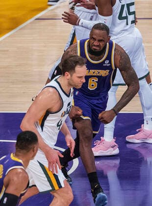 February 16, 2022, Los Angeles, California, USA: LeBron James 6 of the Los Angeles Lakers reacts against defender Bojan Bogdanovic 44 of the Utah Jazz during their NBA, Basketball Herren, USA game on Wednesday February 16, 2022 at Crypto.com Arena in Los Angeles, California. Lakers defeat Jazz, 106-101. PI Los Angeles USA - ZUMAp124 20220216_zaa_p124_037 Copyright: xJAVIERxROJASx