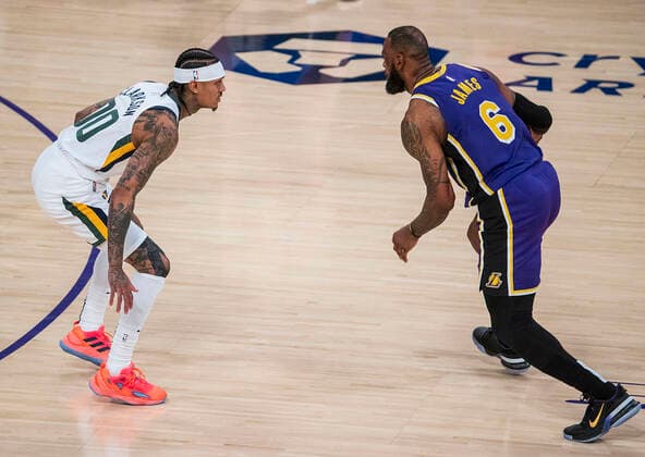 February 16, 2022, Los Angeles, California, USA: LeBron James 6 of the Los Angeles Lakers is defended by Jordan Clarkson 00 of the Utah Jazz during their NBA, Basketball Herren, USA game on Wednesday February 16, 2022 at Crypto.com Arena in Los Angeles, California. Lakers defeat Jazz, 106-101. PI Los Angeles USA - ZUMAp124 20220216_zaa_p124_036 Copyright: xJAVIERxROJASx