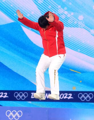 ZHANGJIAKOU, CHINA - FEBRUARY 17, 2022: Gold medal winner Qi Guangpu of China celebrates during the victory ceremony for the men s freestyle skiing aerials, at the Medal Plaza, at the 2022 Winter Olympic Games, Olympische Spiele, Olympia, OS Stanislav Krasilnikov TASS  TS123D4A