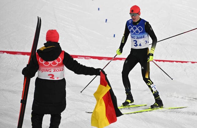 China Olympics 2022 Nordic Combined Team 8118199 17.02.2022 Silver medalist Germany s Vinzenz Geiger reacts after crossing. the finish line in the cross-country race of the nordic combined men s team large hill 4x5 km event during the Beijing 2022 Winter Olympic Games, Olympische Spiele, Olympia, OS at the National Ski jumping, Skispringen, Ski, nordisch Centre in Zhangjiakou, China. Alexey Filippov Sputnik Zhangjiakou China  Copyright: xAlexeyxFilippovx