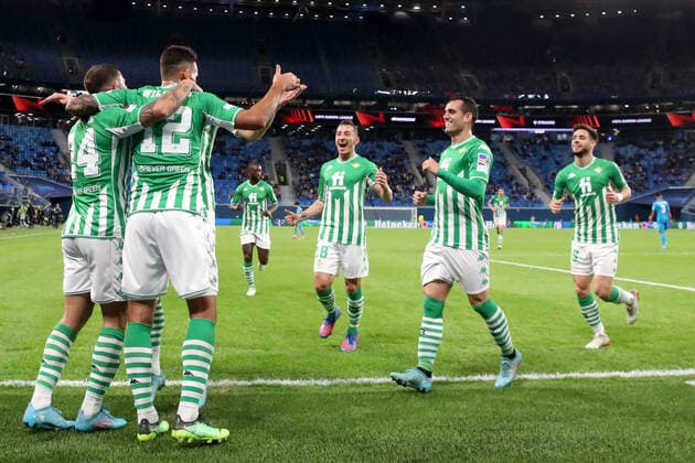 ST PETERSBURG, RUSSIA - FEBRUARY 17, 2022: Betis players celebrate a goal in the 1st leg of the 2021 22 UEFA Europa League play-offs between Zenit St Petersburg and Real Betis Seville at Gazprom Arena. Alexander Demianchuk TASS  TS123EF6