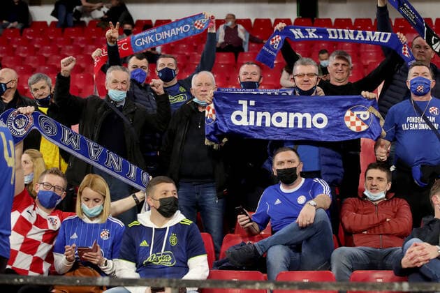 Sevilla FC v Dinamo Zagreb: Knockout Round Play-Offs Leg One - UEFA Europa League Dinamo Zagreb supporters cheer in the stands during the UEFA Europa League Knockout Round Play-Offs Leg One match between Sevilla FC and Dinamo Zagreb at Estadio Ramon Sanchez Pizjuan on February 17, 2022 in Seville, Spain. GoranxStanzl PIXSELL