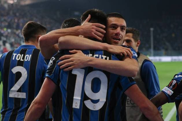 Bergamo, Italy, 17th February 2022. Berat Djimsiti of Atalanta celebrates with team mate Merit Demiral after scoring to give the side a 2-1 lead during the UEFA Europa League match at Gewiss Stadium, Bergamo. Picture credit should read: Jonathan Moscrop Sportimage EDITORIAL USE ONLY. No use with unauthorised audio, video, data, fixture lists, club league logos or live services. Online in-match use limited to 120 images, no video emulation. No use in betting, games or single club league player publications. SPI-1536-0010