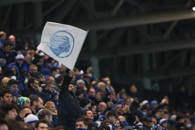 Bergamo, Italy, 17th February 2022. An Atalanta fna waves a flag bearing to logo of the club during the UEFA Europa League match at Gewiss Stadium, Bergamo. Picture credit should read: Jonathan Moscrop Sportimage EDITORIAL USE ONLY. No use with unauthorised audio, video, data, fixture lists, club league logos or live services. Online in-match use limited to 120 images, no video emulation. No use in betting, games or single club league player publications. SPI-1536-0014