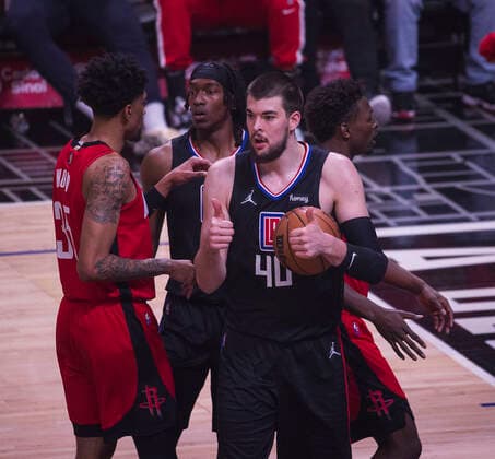 February 17, 2022, Los Angeles, California, USA: Ivica Zubac 40 and Terance Mann 14 of the Los Angeles Clippers wait for the refereeÃ¢â‚¬â ¢s call during their NBA, Basketball Herren, USA game against the Houston Rockets on Thursday February 17, 2022 at Crypto.com Arena in Los Angeles, California. Clippers defeat Rockets, 142-111. ARIANA RUIZ PI Los Angeles USA - ZUMAp124 20220217_zaa_p124_075 Copyright: xArianaxRuizx