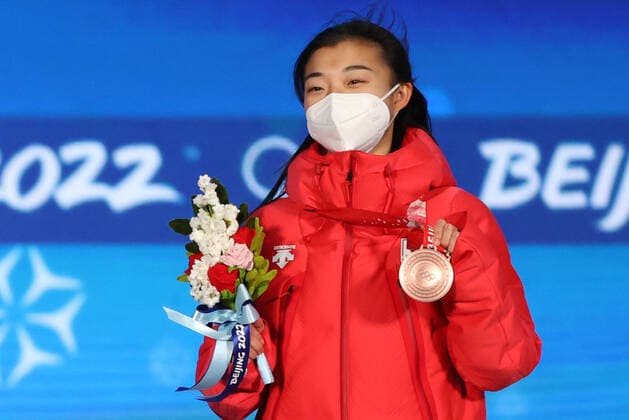 BEIJING, CHINA â€“ FEBRUARY 18, 2022: Figure skater Kaori Sakamoto of Japan poses with her bronze medal at a victory ceremony for the ladies Figure skating, Eiskunstlauf event at the Beijing 2022 Winter Olympic Games, Olympische Spiele, Olympia, OS at the Beijing Medals Plaza. Anton Novoderezhkin TASS  TS12417F