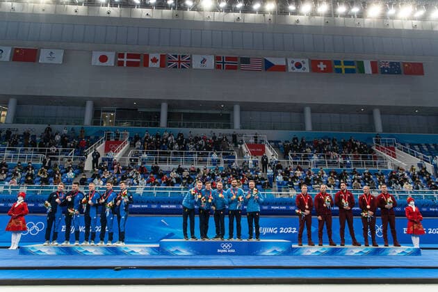 220219 Niklas Edin, Oskar Eriksson, Rasmus Wranaa, Christoffer Sundgren and Daniel Magnusson of Sweden celebrate with their gold medals at the podium after the men?s curling final match between Sweden and Great Britain during day 15 of the 2022 Winter Olympics on February 19, 2022 in Beijing. Photo: Maxim ThorÃ BILDBYRAN kod MT MT0332 curling Olympic Games, Olympische Spiele, Olympia, OS olympics winter olympics os ol olympiska spel vinter-os olympiske leker peking peking 2022 beijing 2022 beijing 2022 olympic games beijing 2022 winter olympic games peking-os beijing-ol vinter-ol 15 bbeng sverige england jubel os-guld Copyright: MAXIMxTHORE BB220219MT078