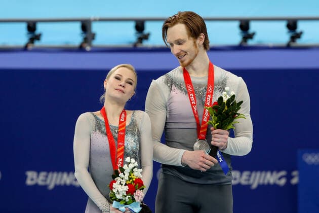 BEIJING, CHINA - FEBRUARY 19, 2022: Silver medalists Yevgenia Tarasova and Vladimir Morozov of Team ROC at a flower ceremony for the pair skating at the 2022 Winter Olympic Games, Olympische Spiele, Olympia, OS at the Capital Indoor Stadium. Valery Sharifulin TASS  TS124568