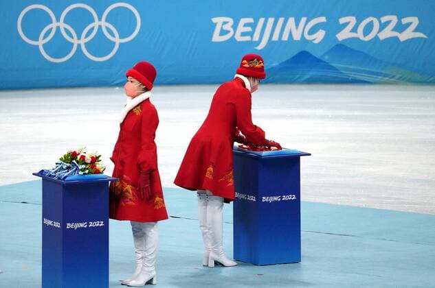 China Olympics 2022 Medal Ceremony 8120838 19.02.2022 Staff members prepare for the medal ceremony for the pairs Figure skating, Eiskunstlauf event during the Beijing 2022 Winter Olympic Games, Olympische Spiele, Olympia, OS at Capital Indoor Stadium in Beijing, China. Alexander Vilf Sputnik Beijing China  Copyright: xAlexanderxVilfx