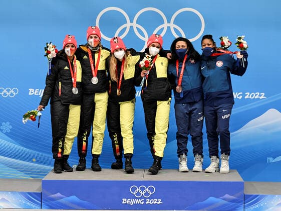 (220219) -- BEIJING, Feb. 19, 2022 -- Silver medalists Mariama Jamanka and Alexandra Burghardt (2nd L) of Germany, gold medalists Laura Nolte (3rd L) and Deborah Levi of Germany and bronze medalists Elana Meyers Taylor (2nd R) and Sylvia Hoffman of the United States pose for a photo during the bobsleigh 2-woman heat of Beijing 2022 Winter Olympics at National Sliding Centre in Yanqing District, Beijing, capital of China, Feb. 19, 2022. ) (BEIJING2022)CHINA-BEIJING-OLYMPIC Winter games, Winterspiele,Spiele, Summer games BOBSLEIGH-2-WOMEN-HEAT (CN) HexChangshan 
