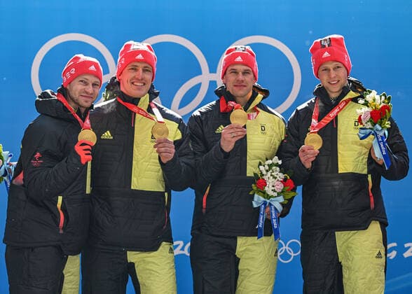 (220220) -- BEIJING, Feb. 20, 2022 -- Francesco Friedrich Thorsten Margis Candy Bauer Alexander Schueller of Germany pose for photos during the awarding ceremony after the bobsleigh 4-man heat of Beijing 2022 Winter Olympics at National Sliding Centre in Yanqing District, Beijing, capital of China, Feb. 20, 2022. ) (BEIJING2022)CHINA-BEIJING-OLYMPIC Winter games, Winterspiele,Spiele, Summer games BOBSLEIGH-4-MEN-HEAT(CN) SunxFei 