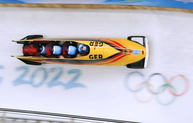 Beijing Olympics: Bobsleigh Germany s Francesco Friedrich, Thorsten Margis, Candy Bauer and Alexander Schueller race en route to winning the four-man bobsleigh competition at the Beijing Winter Olympics on Feb. 20, 2022, at the National Sliding Centre in the Yanqing competition zone.  A14AA0001254044P