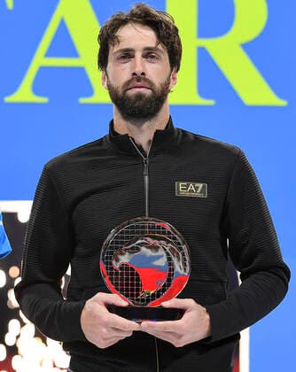 (220220) -- DOHA, Feb. 20, 2022 -- Nikoloz Basilashvili of Georgia holds the runner-up trophy after the ATP, Tennis Herren Qatar Open tennis tournament final at the Khalifa International Tennis Complex in Doha, Feb.19, 2022. (Photo by Xinhua) (SP)QATAR-DOHA-TENNIS-ATP QATAR OPEN Nikku 