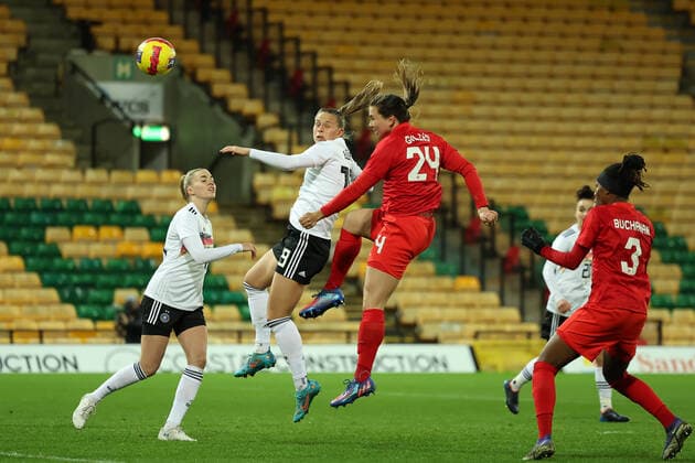 20th February 2022 ; Carrow Road, Norwich, Norforlk, England; Arnold Clark Womens International football Canada versus Germany: Vanessa Gilles ff Canada wins the header and scores for 1-0  ActionPlus12366127 ShaunxBrooks