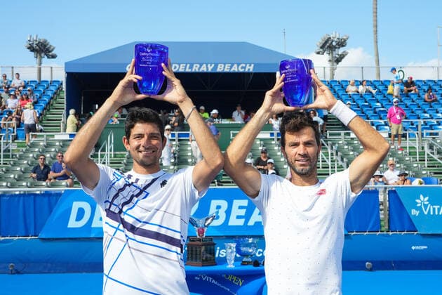 February 20, 2022, Delray Beach, Florida, United States: February, 20 - Delray Beach: Marcelo Arevalo(ESP) Jean-Julien Rojer(NED) pose with the Champions trophy after defeating Aleksandr Nedovyesov(KAZ) Aisam-Ul-Haq Qureshi(PAK) 62 67(5) 10-4 during the 2022 Delray Beach Open by Vitacost Doubles Championship. Delray Beach United States - ZUMApa3_ 0151547814st Copyright: xAndrewxPatronx