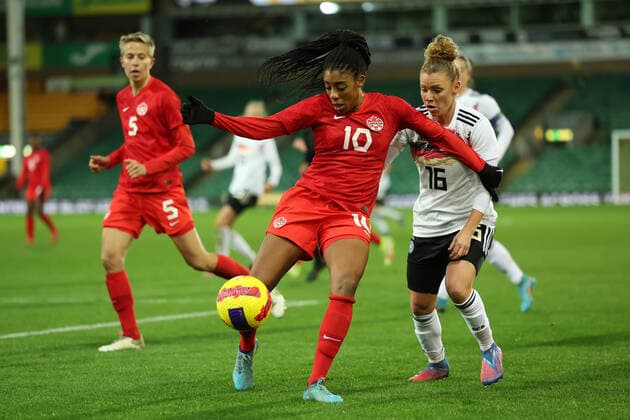 20th February 2022 ; Carrow Road, Norwich, Norforlk, England; Arnold Clark Womens International football Canada versus Germany: Ashley Lawrence of Canada shields the ball from Linda Dallmann of Germany  ActionPlus12366225 ShaunxBrooks