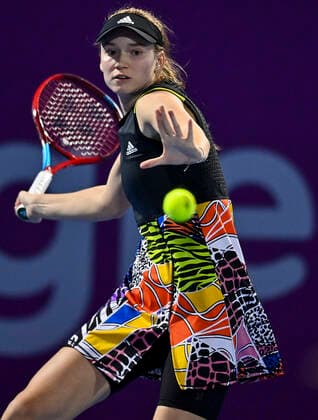 (220222) -- DOHA, Feb. 22, 2022 -- Elena Rybakina of Kazakistan hits a return during the first round of WTA, Tennis Damen Qatar Open tennis tournament match against Jaqueline Cristian of Romania at the Khalifa International Tennis Complex in Doha, capital of Qatar, on Feb. 21, 2022. (Photo by Xinhua) (SP)QATAR-DOHA-TENNIS-WTA QATAR OPEN Nikku 