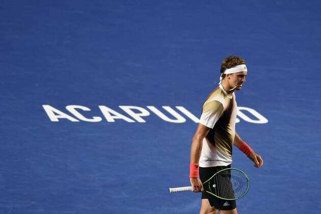 (220222) -- ACAPULCO, Feb. 22, 2022 -- Alexander Zverev of Germany reacts during men s singles first round match against Jenson Brooksby of the United States at the 2022 ATP, Tennis Herren Mexican Open tennis tournament in Acapulco, Mexico, Feb. 22, 2022. ) (SP)MEXICO-ACAPULCO-TENNIS-ATP-MEXICAN OPEN-FIRST ROUND XinxYuewei 