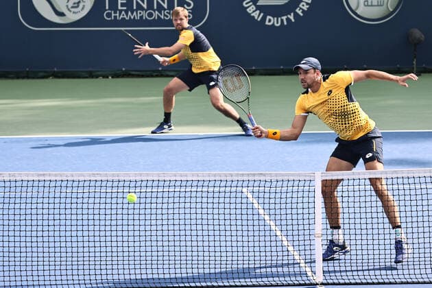 Kevin Krawietz (cap) and Andreas Mies, GER, during mens first round of 2022 Dubai Championships in Dubai, 22 02 2022; -