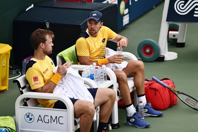 Kevin Krawietz (cap) and Andreas Mies, GER, during mens first round of 2022 Dubai Championships in Dubai, 22 02 2022; -