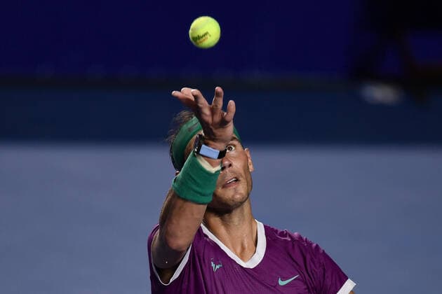 (220223) -- ACAPULCO, Feb. 23, 2022 -- Rafael Nadal of Spain serves during the men s singles first round match against Denis Kudla of the United States at the 2022 ATP, Tennis Herren Mexican Open tennis tournament in Acapulco, Mexico, Feb. 22, 2022. ) (SP)MEXICO-ACAPULCO-TENNIS-ATP-MEXICAN OPEN-FIRST ROUND XinxYuewei 