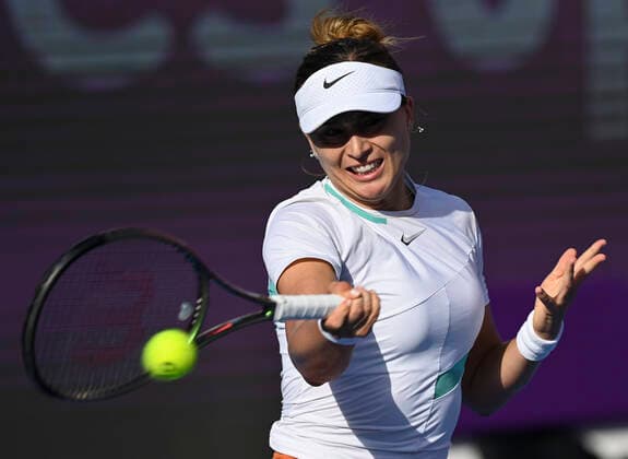 (220223) -- DOHA, Feb. 23, 2022 -- Paula Badosa of Spain hits a return during the round of 16 match of WTA, Tennis Damen Qatar Open tennis tournament between Cori Gauff of the United States and Paula Badosa of Spain at the Khalifa International Tennis Complex in Doha, capital of Qatar, Feb. 23, 2022. (Photo by Nikku Xinhua) (SP)QATAR-DOHA-TENNIS-QATAR OPEN-ROUND OF 16 yangyuanyong 