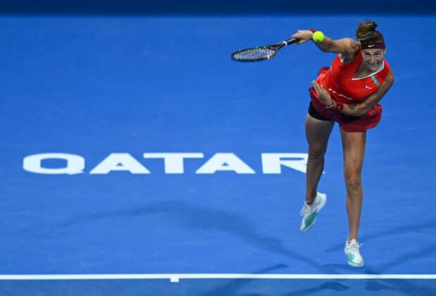(220224) -- DOHA, Feb. 24, 2022 -- Aryna Sabalenka of Belarus serves during the round of 16 match of WTA, Tennis Damen Qatar Open tennis tournament between Jil Teichmann of Switzerland and Aryna Sabalenka of Belarus at the Khalifa International Tennis Complex in Doha, capital of Qatar, Feb. 23, 2022. (Photo by Xinhua) (SP)QATAR-DOHA-TENNIS-QATAR OPEN-ROUND OF 16 Nikku 