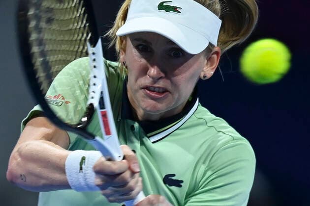 (220224) -- DOHA, Feb. 24, 2022 -- Jil Teichmann of Switzerland hits a return during the round of 16 match of WTA, Tennis Damen Qatar Open tennis tournament between Jil Teichmann of Switzerland and Aryna Sabalenka of Belarus at the Khalifa International Tennis Complex in Doha, capital of Qatar, Feb. 23, 2022. (Photo by Xinhua) (SP)QATAR-DOHA-TENNIS-QATAR OPEN-ROUND OF 16 Nikku 