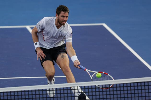 (220224) -- ACAPULCO, Feb. 24, 2022 -- Cameron Norrie of Great Britain hits a return during the men s singles round of 16 match between Cameron Norrie of Great Britain and John Isner of the United States at the 2022 ATP, Tennis Herren Mexican Open tennis tournament in Acapulco, Mexico, Feb. 23, 2022. (Photo by Xinhua) (SP)MEXICO-ACAPULCO-TENNIS-ATP-MEXICAN OPEN-ROUND OF 16 FranciscoxCanedo 