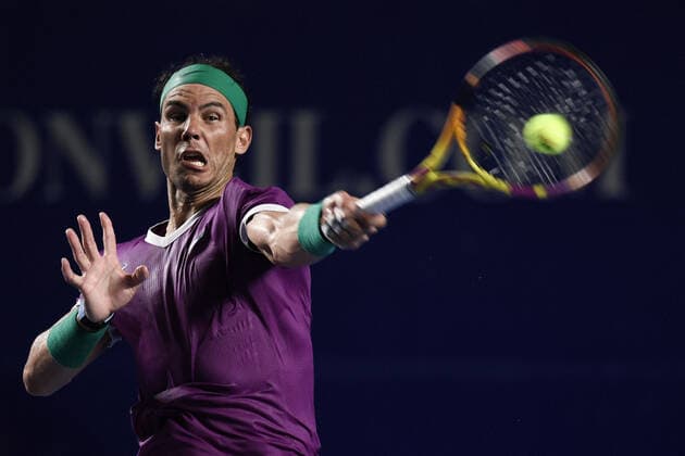 Sport Bilder des Tages (220224) -- ACAPULCO, Feb. 24, 2022 -- Rafael Nadal of Spain hits a return during the men s singles round of 16 match against Stefan Kozlov of the United States at the 2022 ATP, Tennis Herren Mexican Open tennis tournament in Acapulco, Mexico, Feb. 23, 2022. ) (SP)MEXICO-ACAPULCO-TENNIS-ATP-MEXICAN OPEN-ROUND OF 16 XinxYuewei 