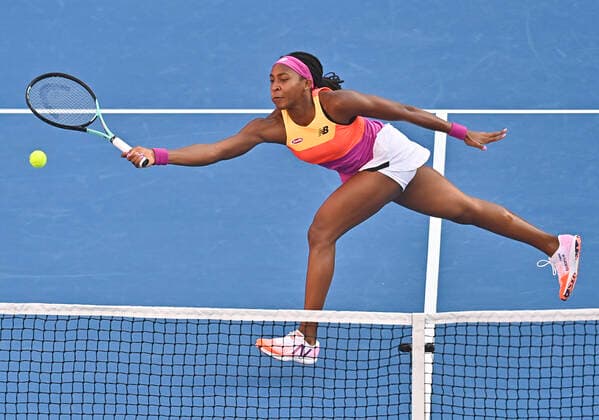 (220224) -- DOHA, Feb. 24, 2022 -- Cori Gauff of the United States hits a return during the quarterfinal match of WTA, Tennis Damen Qatar Open tennis tournament between Maria Sakkari of Greece and Cori Gauff of the United States at the Khalifa International Tennis Complex in Doha, capital of Qatar, Feb. 24, 2022. (Photo by Nikku Xinhua) (SP)QATAR-DOHA-TENNIS-QATAR OPEN-QUARTERFINAL yangyuanyong 
