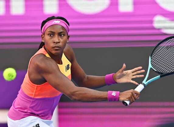 (220224) -- DOHA, Feb. 24, 2022 -- Cori Gauff of the United States hits a return during the quarterfinal match of WTA, Tennis Damen Qatar Open tennis tournament between Maria Sakkari of Greece and Cori Gauff of the United States at the Khalifa International Tennis Complex in Doha, capital of Qatar, Feb. 24, 2022. (Photo by Nikku Xinhua) (SP)QATAR-DOHA-TENNIS-QATAR OPEN-QUARTERFINAL yangyuanyong 
