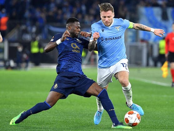 February 24, 2022, ROME: SS Lazio s Ciro Immobile (R) vies for the ball with FC Porto s Chancel Mbemba during the UEFA Europa League playoff second leg soccer match between SS Lazio-FC Porto at the Olimpico stadium in Rome, Italy, 24 February 2022. ANSA ETTORE FERRARI. ROME - ZUMAa110 20220224_zaf_a110_126 Copyright: xEttorexFerrarix