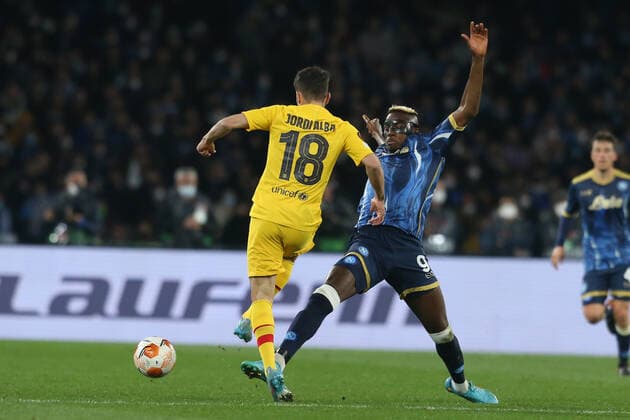 Italy: Europa League football match SSC Napoli vs Barcellona SSC Napoli s Nigerian striker Victor Osimhen challenges for the ball with Barcellona s Spanish defender Jordi Alba during the UEFA Europa League football match between SSC Napoli and Barcellona at the Diego Armando Maradona Stadium in Naples, southern Italy, on February 24, 2022. ABPH8979 Copyright: xAntonioxBalascox