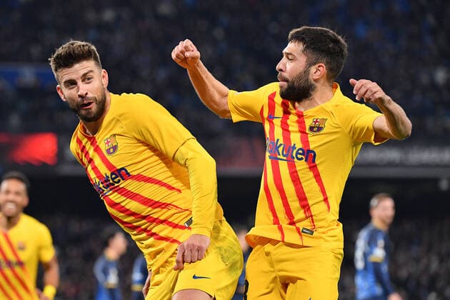 Barcelona s defender Gerard Pique celebrates with Barcelona s defender Jordi Alba after scoring the 1-3 goal during SSC Napoli vs FC Barcellona, football Europa League match in Naples, Italy, February 24 2022  Copyright: xCarmeloxImbesix xipa-agency.netx xx 0