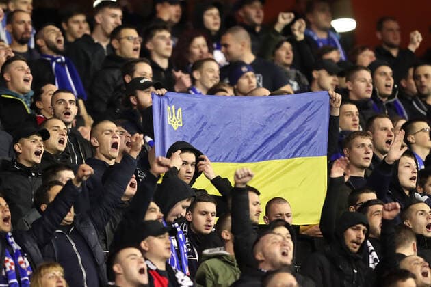 Dinamo Zagreb v Sevilla FC: Knockout Round Play-Offs Leg Two - UEFA Europa League ZAGREB, CROATIA - FEBRUARY 24: Fans of Dinamo Zagreb with the Ukrainian flag during the UEFA Europa League Knockout Round Play-Offs Leg Two match between Dinamo Zagreb and Sevilla FC at Maksimir Stadium on February 24, 2022 in Zagreb, Croatia. LukaxStanzl PIXSELL