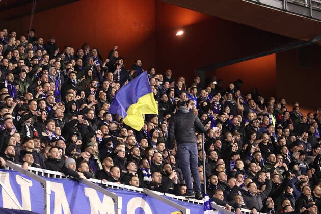 Dinamo Zagreb v Sevilla FC: Knockout Round Play-Offs Leg Two - UEFA Europa League ZAGREB, CROATIA - FEBRUARY 24: Fans of Dinamo Zagreb with the Ukrainian flag during the UEFA Europa League Knockout Round Play-Offs Leg Two match between Dinamo Zagreb and Sevilla FC at Maksimir Stadium on February 24, 2022 in Zagreb, Croatia. LukaxStanzl PIXSELL