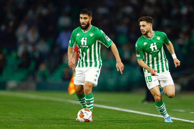 ESP: Real Betis-Zenit. UEFA Europa League Nabil Fekir and Alex Moreno of Real Betis during the UEFA Europa League match, round of 32 between Real Betis and Zenit played at Benito Villamarin Stadium on February 24, 2022 in Sevilla, Spain. (Antonio Pozo PRESSINPHOTO) kpng Copyright: xAntonioxPozox xPRESSINPHOTOx AP_240222_019