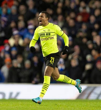 Football - 2021 2022 UEFA Europa League - Round of 32 - Second Leg - Glasgow Rangers vs Borussia Dortmund - Ibrox Stadium - Thursday 24th February 2022. Donyell Malen of Borussia Dortmund scores to make it 2-1 to Borussia Dortmund 