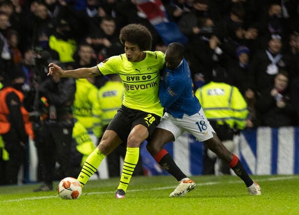 Football - 2021 2022 UEFA Europa League - Round of 32 - Second Leg - Glasgow Rangers vs Borussia Dortmund - Ibrox Stadium - Thursday 24th February 2022. Axel Witsel of Borussia Dortmund vies Wirth Glen Kamara of Rangers 