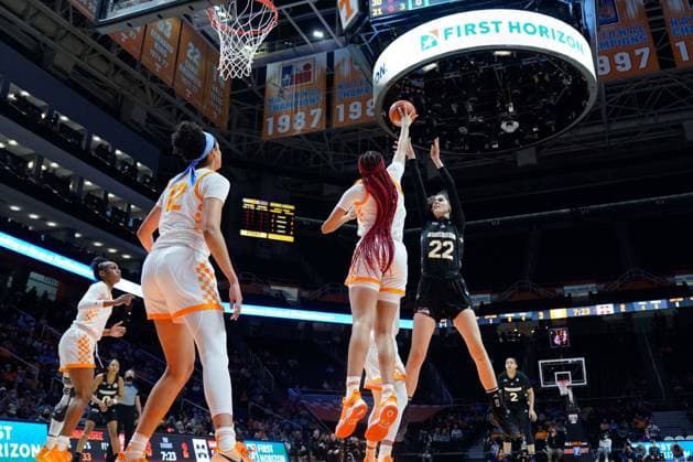 February 24, 2022: Charlotte Kohl 22 of the Mississippi State Bulldogs attempts to shoots the ball over Tamari Key 20 of the Tennessee Lady Vols who blocks the shot during the NCAA, College League, USA basketball game between the University of Tennessee Lady Volunteers and the Mississippi State Bulldogs at Thompson Boling Arena in Knoxville TN CSM Knoxville United States - ZUMAc04_ 20220224_zaf_c04_027 Copyright: xTimxGangloffx