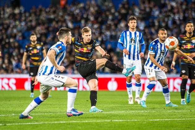 February 24, 2022, San Sebastian, Spain: Dani Olmo (C) of RB Leipzig, Igor Zubeldia (L) and Rafael Alcantara (R2) of Real Sociedad seen in action during the UEFA Europa League match between Real Sociedad and RB Leipzig at Reale Arena in San Sebastian..Final score; Real Sociedad 1:3 RB Leipzig San Sebastian Spain - ZUMAs197 20220224_zaa_s197_399 Copyright: xThiagoxPrudenciox