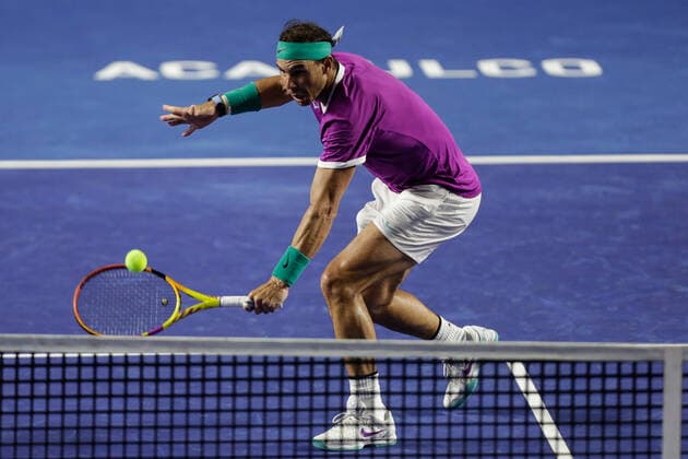 (220225) -- ACAPULCO, Feb. 25, 2022 -- Rafael Nadal of Spain hits a return during the men s singles quarterfinal match against Tommy Paul of the United States at the 2022 ATP, Tennis Herren Mexican Open tennis tournament in Acapulco, Mexico, Feb. 24, 2022. (Photo by Francisco Canedo Xinhua) (SP)MEXICO-ACAPULCO-TENNIS-ATP-MEXICAN OPEN-QUARTERFINALS FuxLangxisike¡¤kanieduo 