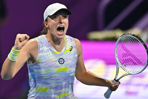 (220226) -- DOHA, Feb. 26, 2022 -- Iga Swiatek of Poland celebrates after the semifinal match of WTA, Tennis Damen Qatar Open tennis tournament against Maria Sakkari of Greece in Doha, capital of Qatar, Feb. 25, 2022. (Photo by Xinhua) (SP)QATAR-DOHA-TENNIS-WTA QATAR OPEN-SEMIFINALS Nikku 