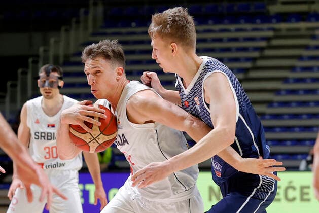 (220226) -- BELGRADE, Feb. 26, 2022 -- Serbia s Aleksa Radanov (front L) vies with Slovakia s Marek Dolezaj during their FIBA Basketball World Cup 2023 qualifying match in Belgrade, Serbia on Feb. 25, 2022. (Photo by Xinhua) (SP)SERBIA-BELGRADE-BASKETBALL-FIBA-SERBIA VS SLOVAKIA PredragxMilosavljevic 
