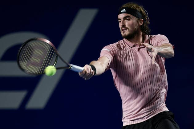 (220226) -- ACAPULCO, Feb. 26, 2022 -- Stefanos Tsitsipas of Greece hits a return during the men s singles semifinal match against Cameron Norrie of Great Britain at the 2022 ATP, Tennis Herren Mexican Open tennis tournament in Acapulco, Mexico, Feb. 25, 2022. ) (SP)MEXICO-ACAPULCO-TENNIS-ATP-MEXICAN OPEN-SEMIFINALS XinxYuewei 