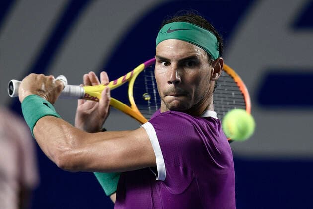 (220226) -- ACAPULCO, Feb. 26, 2022 -- Rafael Nadal of Spain hits a return during the men s singles semifinal match against Daniil Medvedev of Russia at the 2022 ATP, Tennis Herren Mexican Open tennis tournament in Acapulco, Mexico, Feb. 25, 2022. ) (SP)MEXICO-ACAPULCO-TENNIS-ATP-MEXICAN OPEN-SEMIFINALS XinxYuewei 